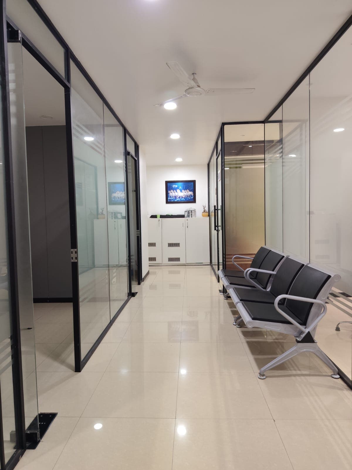 Glass consultation suites inside Dr Gopi's Specialty Clinics